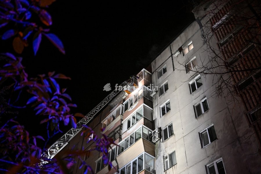 An aerial ladder is seen outside a nine-story residential building hit by a Russian drone during efforts to eliminate the aftermath of the Russian strike in the Kosmichnyi district of Zaporizhzhia, Ukraine, on October 5, 2026. Five people were injured in the Russian attack, one of them seriously.…