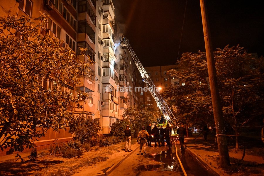 An aerial ladder is seen near a nine-story residential building hit by a Russian drone during efforts to eliminate the aftermath of the Russian strike in the Kosmichnyi district of Zaporizhzhia, Ukraine, on October 5, 2026. Five people were injured in the Russian attack, one of them seriously.…