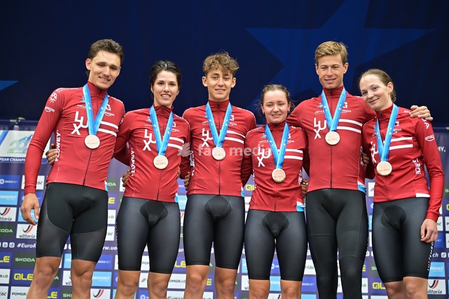 Third placed Team Luxembourg celebrates on the podium of the time trial mixed relay elite race (44,2 km) at the cycling UEC Road European Championships, in Ljubljana, Slovenia Tuesday 6 October 2026. The UEC Road European Championships are taking place from 02 to 07 October in Ljubljana, Slovenia