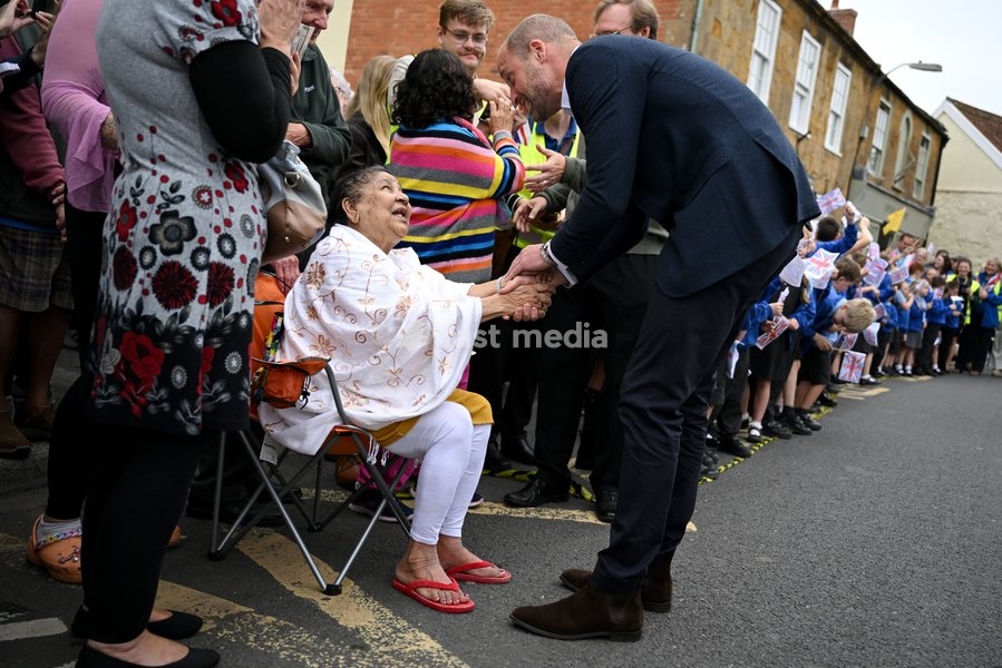 ILMINSTER, ENGLAND - OCTOBER 06: Prince William, Prince of Wales shakes hands with locals during his visit to Sweet Surprise cafe on October 06, 2026 in Ilminster, England. The Prince of Wales visited Ilminster in Somerset to learn about communities growing their resilience to wild fires, flood and…