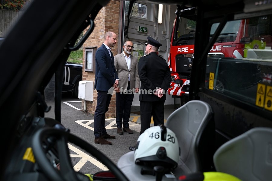 ILMINSTER, ENGLAND - OCTOBER 06: Prince William, Prince of Wales speaks with Mohammed Sadiq the Lord-Lieutenant of Somerset and Chief Fire Officer Simon Young during his visit to Ilminster Fire Station on October 06, 2026 in Ilminster, England. The Prince of Wales visited Ilminster in Somerset to…