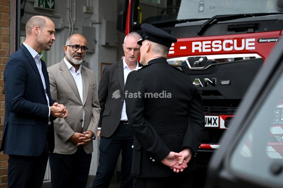 ILMINSTER, ENGLAND - OCTOBER 06: Prince William, Prince of Wales speaks with Mohammed Sadiq the Lord-Lieutenant of Somerset and Chief Fire Officer Simon Young during his visit to Ilminster Fire Station on October 06, 2026 in Ilminster, England. The Prince of Wales visited Ilminster in Somerset to…