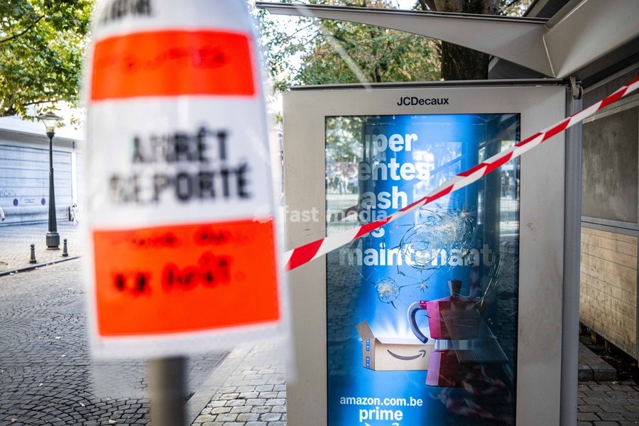 A broken glass panel is seen at a bus stop in the centre of Liège as students gather outside several schools in Liège during a protest against education reforms and budget cuts, on Tuesday 6 October 2026. Yesterday police arrested 16 people after the protests turned violent. The protests in…