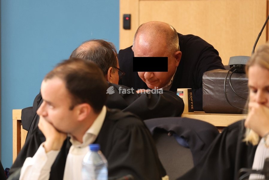 lawyer Jean-Philippe Mayence and the accused Nicolas Ullens de Schooten pictured during the verdict session of the assize trial of Nicolas Ullens de Schooten at the Assize Court of the Brabant Wallon province in Nivelles, Tuesday 6 October 2026. Ullens is accused of killing his step-mother, 70 year…