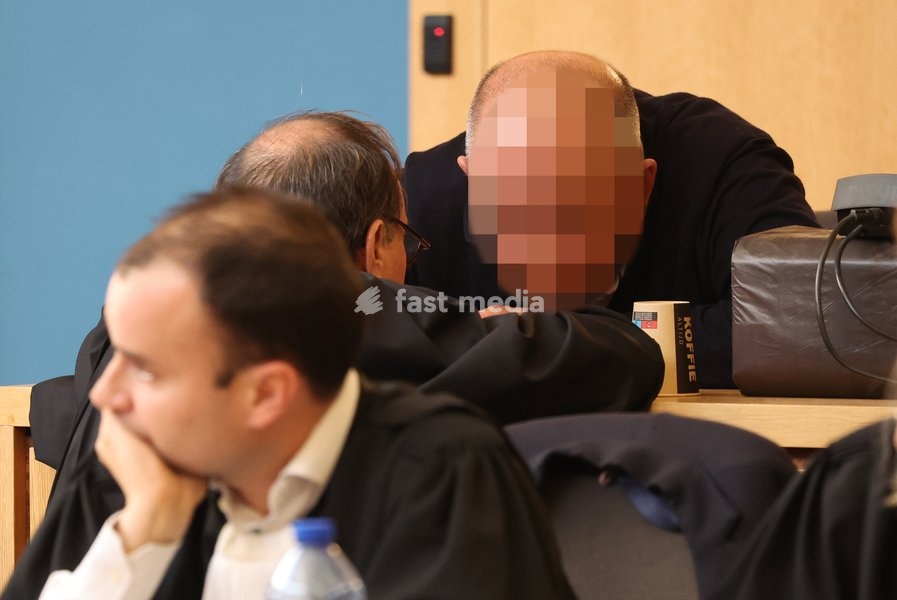 lawyer Jean-Philippe Mayence and the accused Nicolas Ullens de Schooten pictured during the verdict session of the assize trial of Nicolas Ullens de Schooten at the Assize Court of the Brabant Wallon province in Nivelles, Tuesday 6 October 2026. Ullens is accused of killing his step-mother, 70 year…