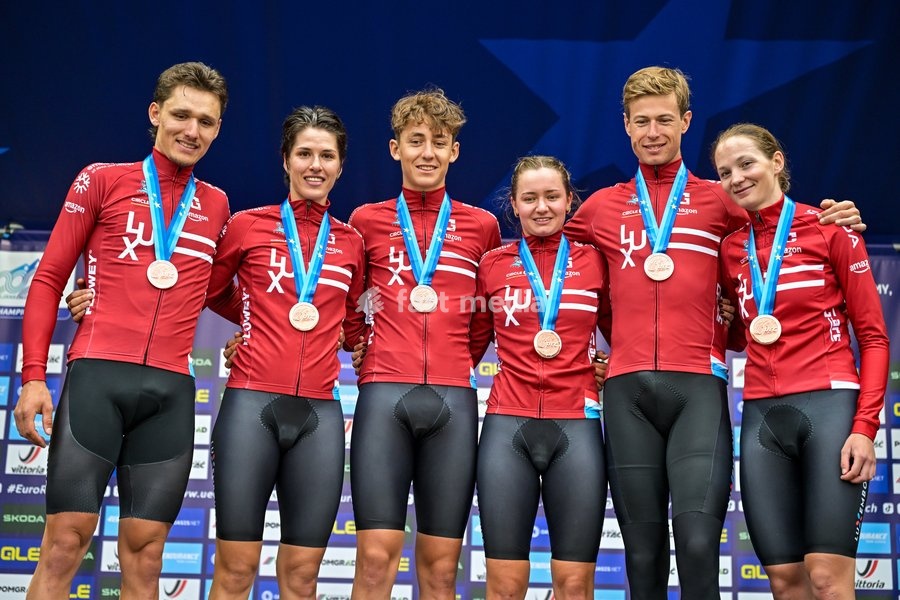 Third placed Team Luxembourg celebrates on the podium of the time trial mixed relay elite race (44,2 km) at the cycling UEC Road European Championships, in Ljubljana, Slovenia Tuesday 6 October 2026. The UEC Road European Championships are taking place from 02 to 07 October in Ljubljana, Slovenia