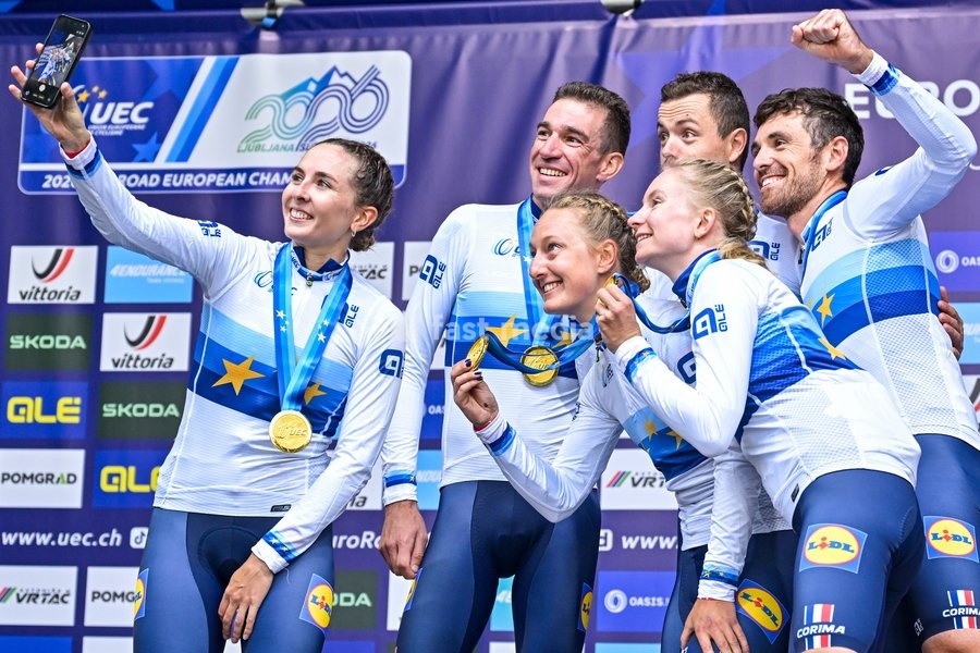 Team France celebrates on the podium after winning the time trial mixed relay elite race (44,2 km) at the cycling UEC Road European Championships, in Ljubljana, Slovenia Tuesday 6 October 2026. The UEC Road European Championships are taking place from 02 to 07 October in Ljubljana, Slovenia