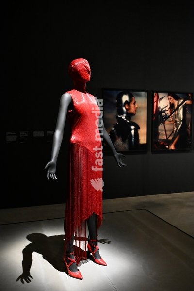 London, UK. Red Dress by Alexander McQueen. Art & Fashion, Tate Britain. Tate Britain has opened the first exhibition to explore the art, photography and fashion of the 1990s, adecade synonymous with possibility, optimism and an audacious spirit. The 90s : Art and Fashion explores this period's…