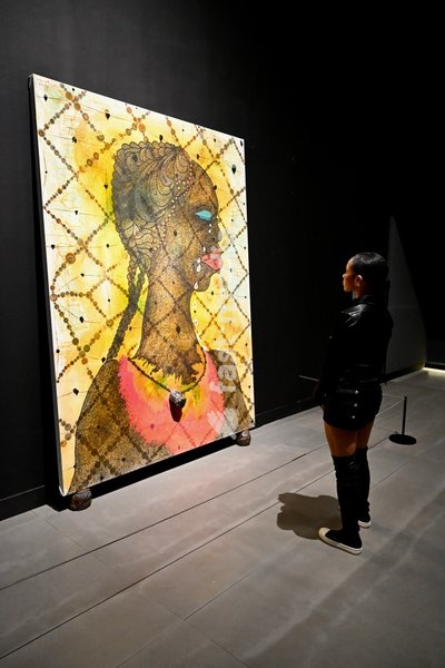 London, UK. No Women, No Cry, 1998 by Chris Ofili. Art & Fashion, Tate Britain. Tate Britain has opened the first exhibition to explore the art, photography and fashion of the 1990s, adecade synonymous with possibility, optimism and an audacious spirit. The 90s : Art and Fashion explores this…