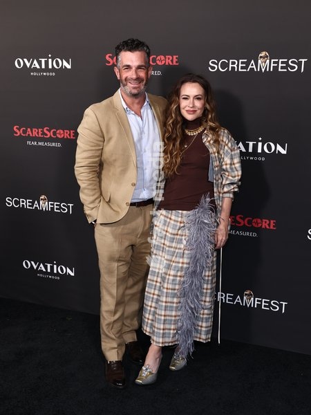 David Bugliari and Alyssa Milano at the 26th Annual Screamfest Horror Film Festival - Opening Night - World Premiere Of Jeremy Weiss' 'The Night Driver' held at TCL Chinese 6 Theatres at Ovation Hollywood on October 6, 2026 in Hollywood, Los Angeles, California, United States