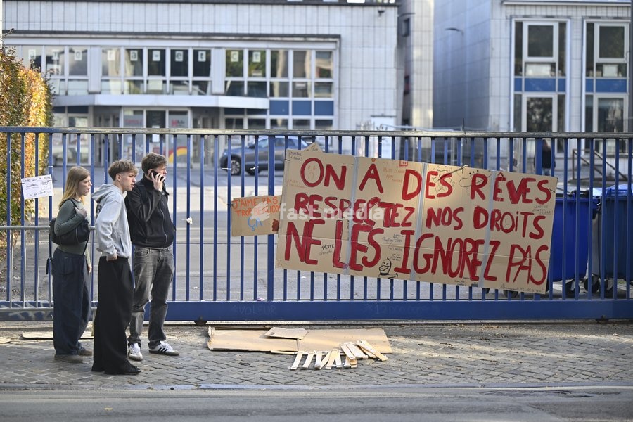 students gather outside Leoni de Waha school in Liege city center during a protest against education reforms and budget cuts, on Wednesday 7 October 2026. On Monday police arrested 16 people after the protests turned violent. About a hundred rioters continued to vandalize the city centre and face…