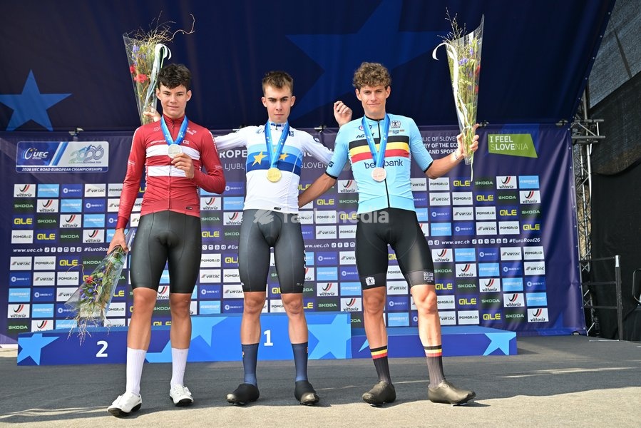 Denmark's Malthe Risbjerg; Spain's Benjamin Noval Suarez and Belgium's Vic De Smet celebrate on the podium of the Men Junior Individual Time Trial race (22km) at the cycling UEC Road European Championships, in Ljubljana, Slovenia, on Wednesday 7 October 2026. The UEC Road European Championships are…
