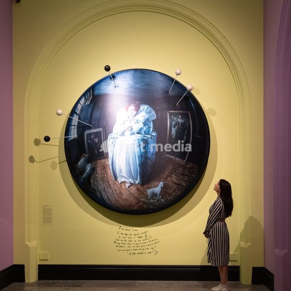 A staff member views 'Liz Carr as Elizabeth I' by Tim Walker as part of The National Portrait Gallery's 'Tim Walker's Fairyland: Love and Legends' Exhibition which runs from 9th October 2026 - 7th February 2027 at National Portrait Gallery in London, England, UK on Wednesday 7 October, 2026