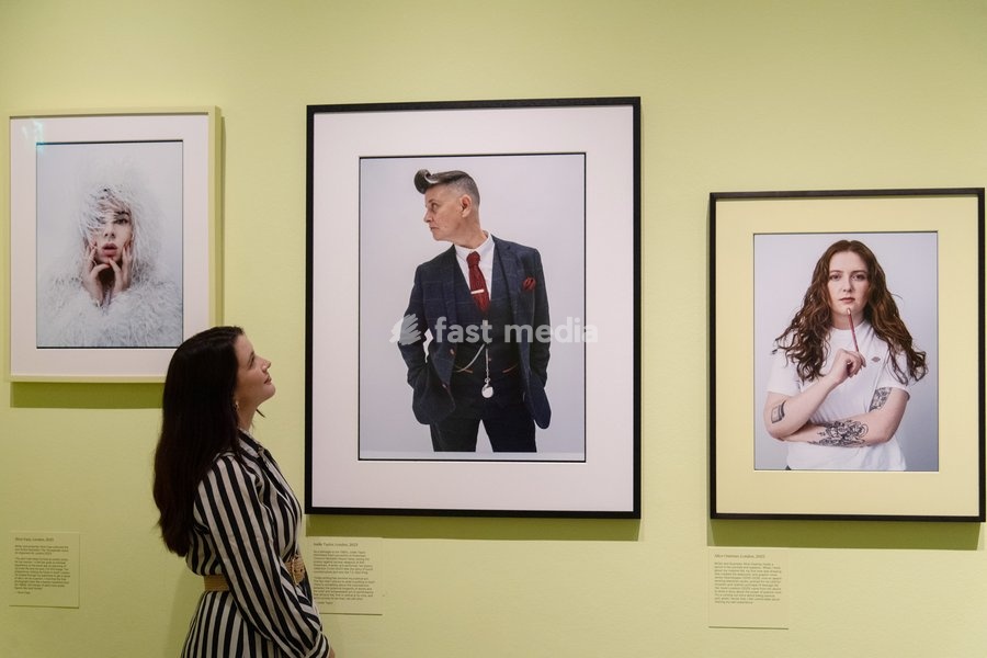 A staff member views (L-R) - 'Shon Faye', 'Joelle Taylor', 'Alice Oseman' all by Tim Walker as part of The National Portrait Gallery's 'Tim Walker's Fairyland: Love and Legends' Exhibition which runs from 9th October 2026 - 7th February 2027 at National Portrait Gallery in London, England, UK on…
