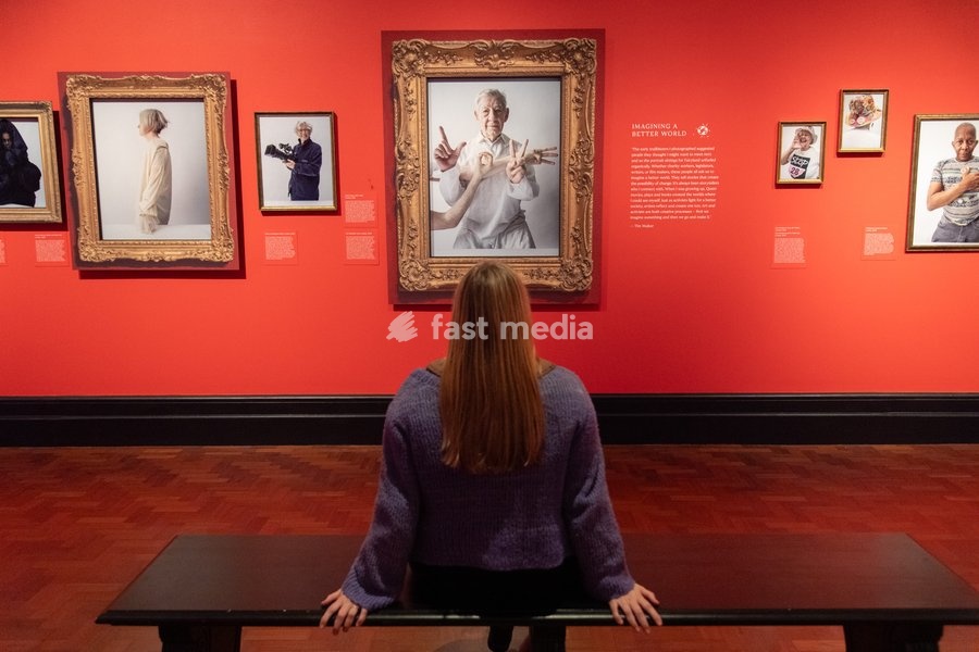 A staff member views (L-R) - 'Fiona Cunningham-Reid', 'April Ashley' and 'Ian McKellen' all by Tim Walker as part of The National Portrait Gallery's 'Tim Walker's Fairyland: Love and Legends' Exhibition which runs from 9th October 2026 - 7th February 2027 at National Portrait Gallery in London,…