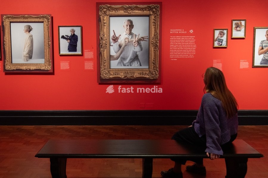 A staff member views (L-R) - 'Fiona Cunningham-Reid', 'April Ashley' and 'Ian McKellen' all by Tim Walker as part of The National Portrait Gallery's 'Tim Walker's Fairyland: Love and Legends' Exhibition which runs from 9th October 2026 - 7th February 2027 at National Portrait Gallery in London,…