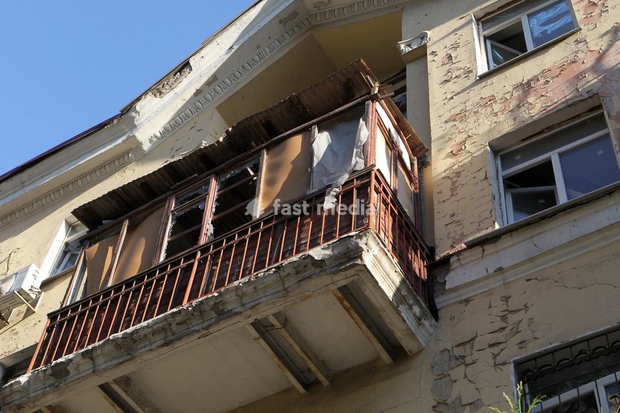 A balcony of a residential building damaged in a Russian missile strike is seen in Dnipro, Ukraine, on October 6, 2026. Russian forces attacked Dnipro with missiles, damaging an industrial enterprise, apartment buildings, and a sports club