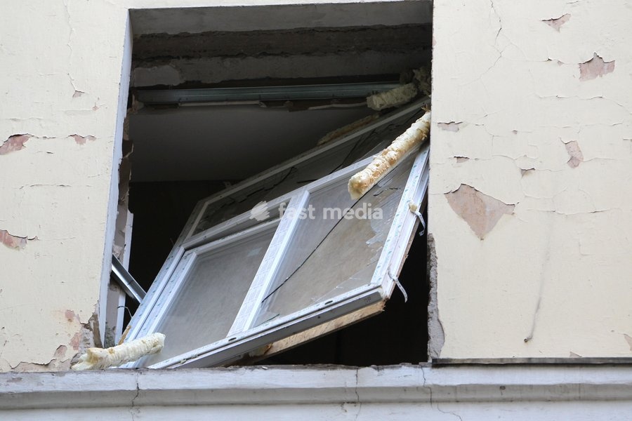 A blown-out window frame of a building damaged in a Russian missile strike, Dnipro, Ukraine, on October 6, 2026. Russian forces attacked Dnipro with missiles, damaging an industrial enterprise, apartment buildings, and a sports club