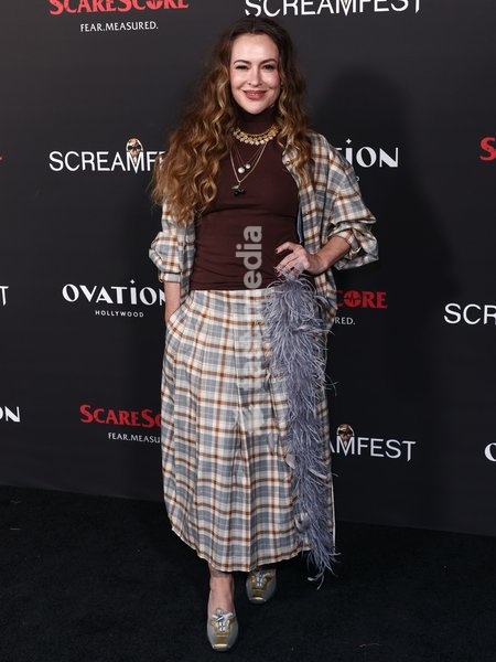 HOLLYWOOD, LOS ANGELES, CALIFORNIA, USA - OCTOBER 06: Alyssa Milano arrives at the 26th Annual Screamfest Horror Film Festival - Opening Night - World Premiere Of Jeremy Weiss' 'The Night Driver' held at TCL Chinese 6 Theatres at Ovation Hollywood on October 6, 2026 in Hollywood, Los Angeles,…