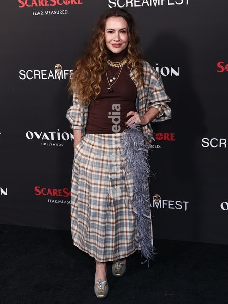 HOLLYWOOD, LOS ANGELES, CALIFORNIA, USA - OCTOBER 06: Alyssa Milano arrives at the 26th Annual Screamfest Horror Film Festival - Opening Night - World Premiere Of Jeremy Weiss' 'The Night Driver' held at TCL Chinese 6 Theatres at Ovation Hollywood on October 6, 2026 in Hollywood, Los Angeles,…