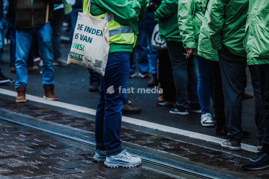 Protestors gather at the headquarters of conservative Flemish nationalist party N-VA, during a national manifestation against the Federal Government's budgetary measures, under the 'Keep your hands out of our pockets!' (Blijf uit onze zakken! - Pas dans nos poches) moniker, organized by the trade…