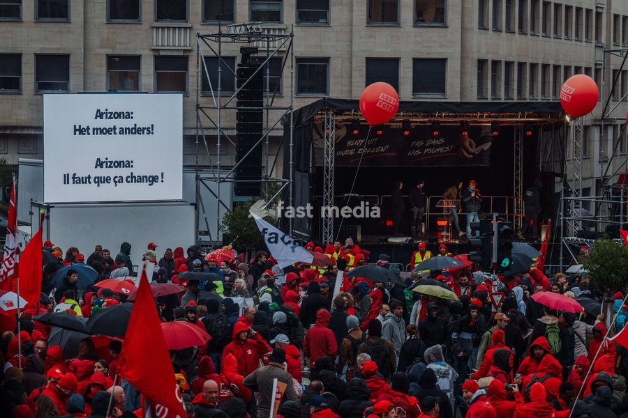 Protesters pictured during a national manifestation against the Federal Government's budgetary measures, under the 'Keep your hands out of our pockets!' (Blijf uit onze zakken! - Pas dans nos poches) moniker, organised by the trade unions on Friday 9 October 2026 in Brussels