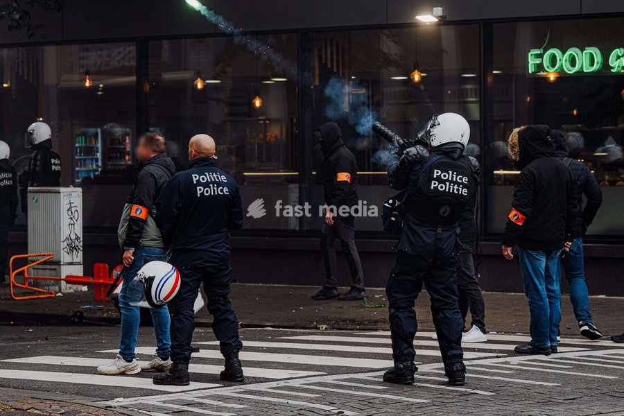 Police officers pictured during a national manifestation against the Federal Government's budgetary measures, under the 'Keep your hands out of our pockets!' (Blijf uit onze zakken! - Pas dans nos poches) moniker, organised by the trade unions on Friday 9 October 2026 in Brussels