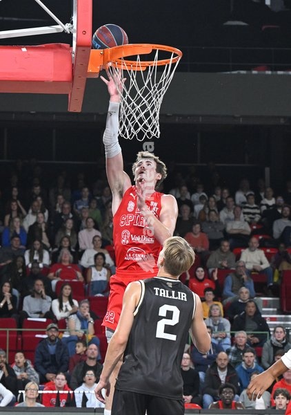 Spirou's Douglas JR Konieczny scoring during a basketball match between Spirou Charleroi and CityX Mons-Hainaut, Friday 9 October 2026 in Charleroi, on the opening day of the 'BNXT League' Belgian and Dutch first division basket championships