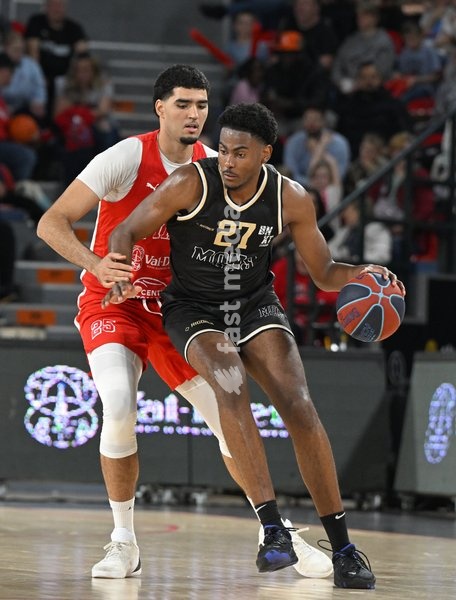 Spirou's Mohammed Ali Tlarhi Amrani and Mons' Fortune Katiki fight for the ball during a basketball match between Spirou Charleroi and CityX Mons-Hainaut, Friday 9 October 2026 in Charleroi, on the opening day of the 'BNXT League' Belgian and Dutch first division basket championships