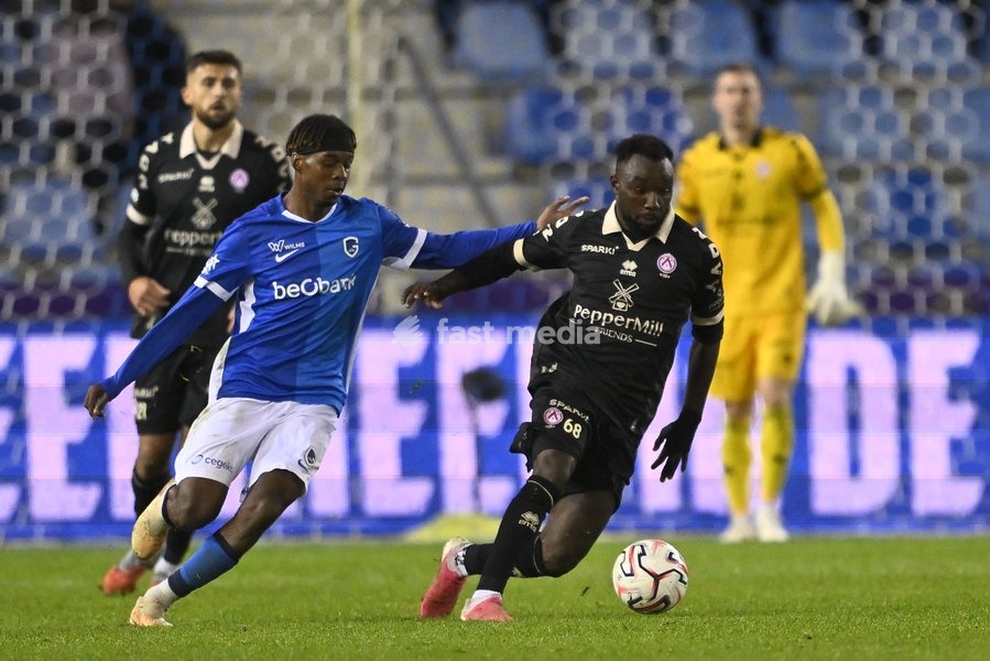 Genk's Noah Adedji-Sternberg and Kortrijk's Thierry Ambrose fight for the ball during a soccer match between KRC Genk and KV Kortrijk, Saturday 10 October 2026 in Genk, on day 8 of the 2026-2027 'Jupiler Pro League' first division of the Belgian championship, in Genk