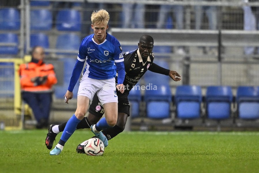 Genk's Jeppe Erenbjerg and Kortrijk's Mohamed Fofana fight for the ball during a soccer match between KRC Genk and KV Kortrijk, Saturday 10 October 2026 in Genk, on day 8 of the 2026-2027 'Jupiler Pro League' first division of the Belgian championship, in Genk