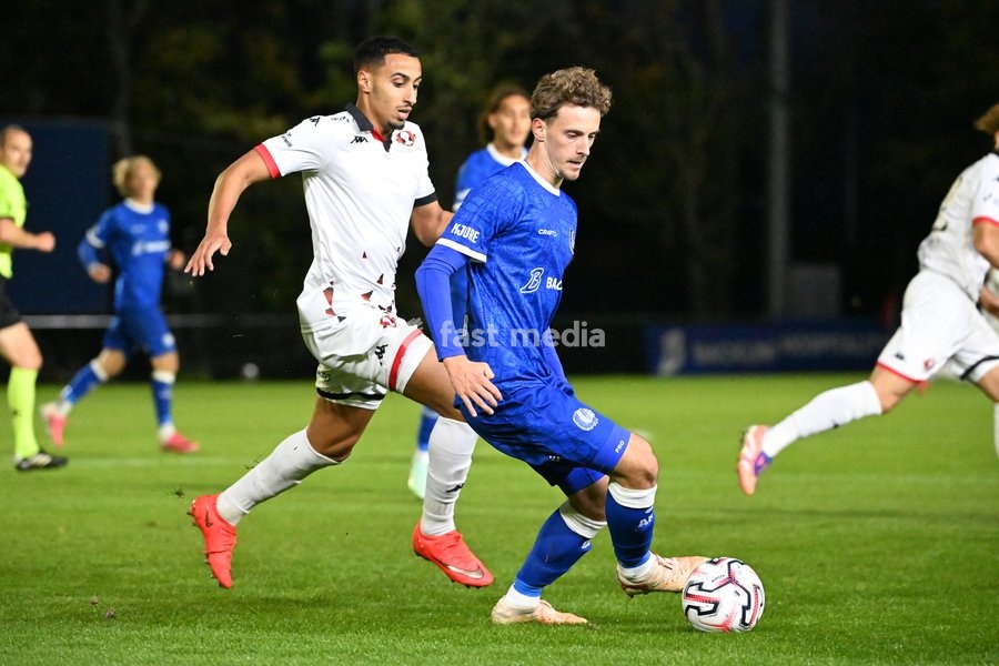 Seraing's Amine Messoussa and Jong Gent's Gilles De Meyer fight for the ball during a soccer match between Jong KAA Gent and FCV Rfc Seraing, Sunday 11 October 2026 in Gent, on day 7 of the 2026-2027 'Challenger Pro League' second highest division of the Belgian championship