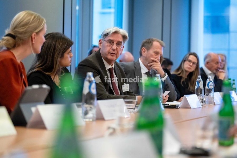 Belga CEO Patrick Lacroix (C) is pictured during a meeting of the News Media Coalition (NMC) on Tuesday 13 October 2026, in Brussels