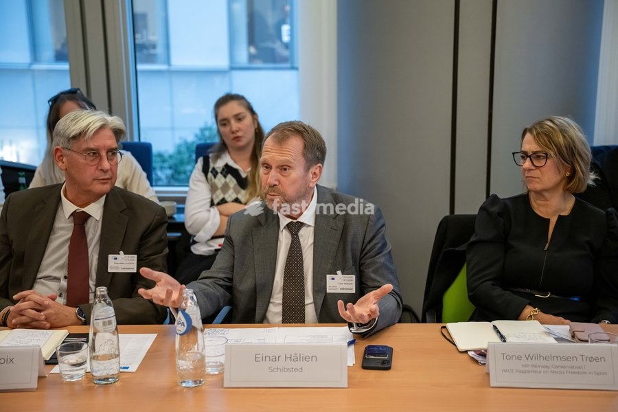 Schibsted Senior Public Policy Adviser Einar Hålien (C) and Belga CEO Patrick Lacroix (L) are pictured during a meeting of the News Media Coalition (NMC) on Tuesday 13 October 2026, in Brussels
