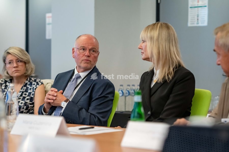 European Parliament MEP Maria Guzenina (R) and NMC CEO Andrew Moger (L) are pictured at a meeting of the News Media Coalition (NMC) on Tuesday 13 October 2026, in Brussels