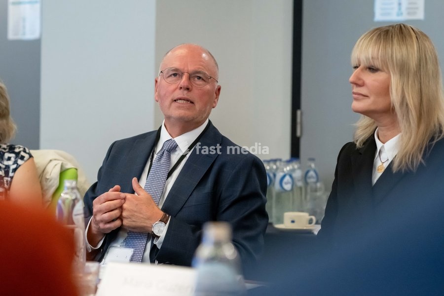 European Parliament MEP Maria Guzenina (R) and NMC CEO Andrew Moger (L) are pictured at a meeting of the News Media Coalition (NMC) on Tuesday 13 October 2026, in Brussels