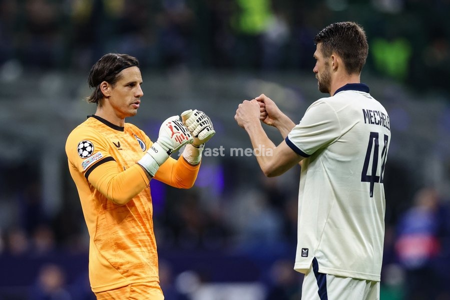 Club's goalkeeper Yann Sommer and Club's Brandon Mechele pictured at the start of a soccer game between Italian Inter Milan and Belgian Club Brugge KV, Tuesday 13 October 2026 in Milan, Italy, on day 2 of the UEFA Champions League league phase