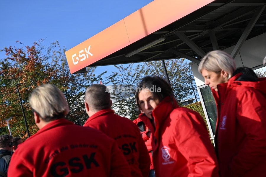 Unions pictured outside during an extraordinary works council at GSK Vaccine site in Wavre, on Wednesday 14 October 2026. The British pharmaceutical company GSK is one of the major employers in Wallonia, with sites in Wavre and Rixensart in Walloon Brabant, and Gembloux in Namur. 8,500 people work…
