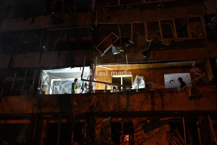 Rescuers work at the site of a Russian missile strike on a nine-story residential building in Kyiv’s Desnianskyi district, Ukraine, on October 14, 2026. Russia launched a massive ballistic missile attack on the capital. Three women were killed and 19 people were injured in the Desnianskyi district,…