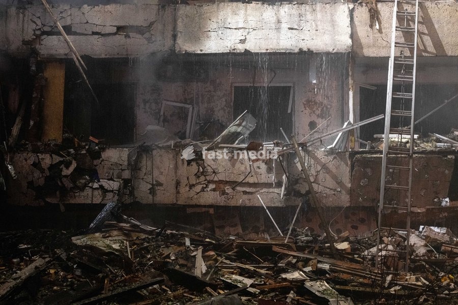 The aftermath of a Russian missile strike on a nine-story residential building is seen in Kyiv’s Desnianskyi district, Ukraine, on October 14, 2026. Russia launched a massive ballistic missile attack on the capital. Three women were killed and 19 people were injured in the Desnianskyi district,…