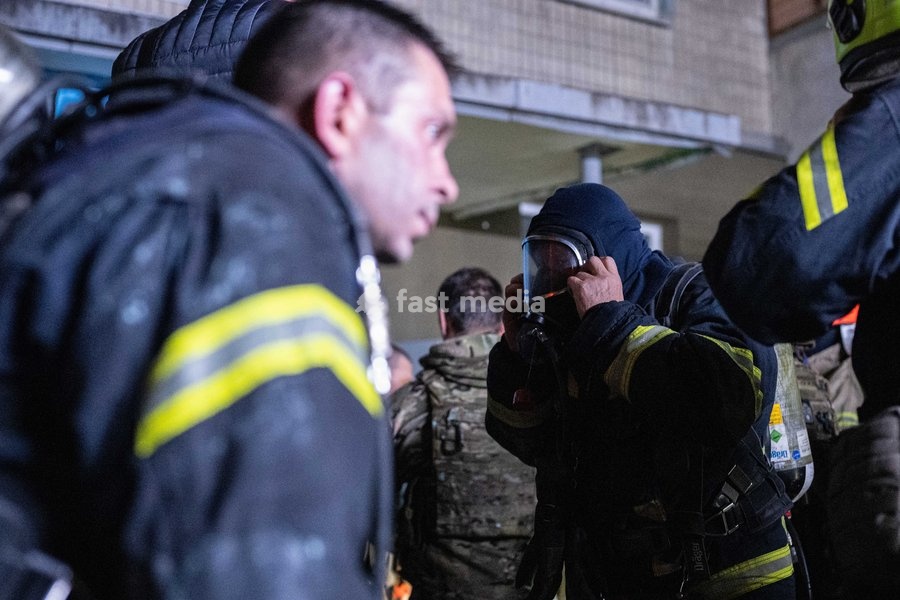 Rescuers work at the scene of a Russian missile strike on a nine-story residential building in Kyiv’s Desnianskyi district, Ukraine, on October 14, 2026. Russia launched a massive ballistic missile attack on the capital. Three women were killed and 19 people were injured in the Desnianskyi…