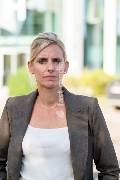 GSK Communication Director Elisabeth Van Damme poses for the photographer as a GSK Belgium extraordinary works council is taking place in GSK Vaccine site in Wavre, on Wednesday 14 October 2026. The British pharmaceutical company GSK is one of the major employers in Wallonia, with sites in Wavre…