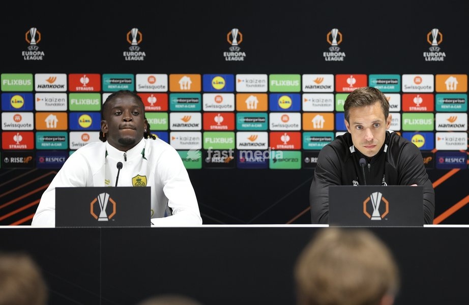 Union's Massire Sylla and Union's head coach David Hubert pictured during a press conference of Belgian soccer team Royale Union Saint-Gilloise, Wednesday 14 October 2026 in Leuven. The team is preparing for the 2nd match of the UEFA Europa League league phase against Spanish Real Sociedad tomorrow
