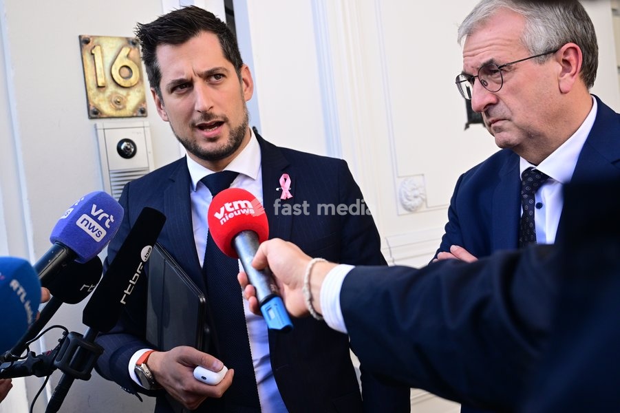 Walloon Minister President Adrien Dolimont and Vice-President and Walloon Minister in charge of the Economy, Employment, Industry and Training Pierre-Yves Jeholet pictured talking to the press before a meeting between workers of the GSK vaccine manufacturer and the Belgian governments, after it was…