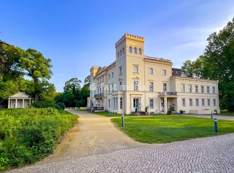 Schloss Steinhöfel palace in Brandenburg, Germany - elegant neoclassical architecture surrounded by parkland and historic gardens