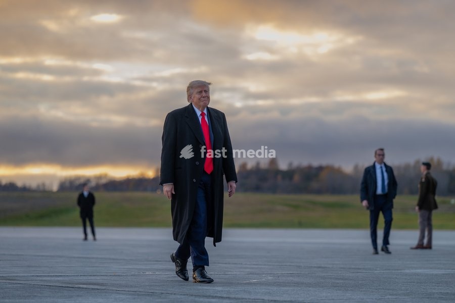 Trump disembarks Marine One and boards Air Force One at Joint Base Elmendorf-Richardson in Anchorage, Alaska