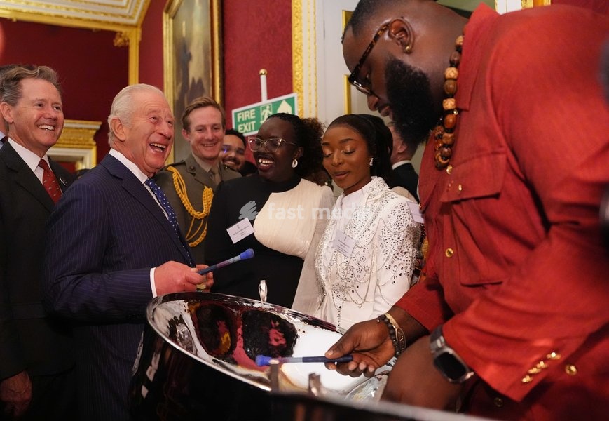King Charles III tries his hand at playing a steelpan drum with Khan Cordice during a reception at St. James's Palace in London, to celebrate the Commonwealth Diaspora, ahead of the Commonwealth Heads of Government Meeting in Antigua and Barbuda. Picture date: Wednesday October 14, 2026