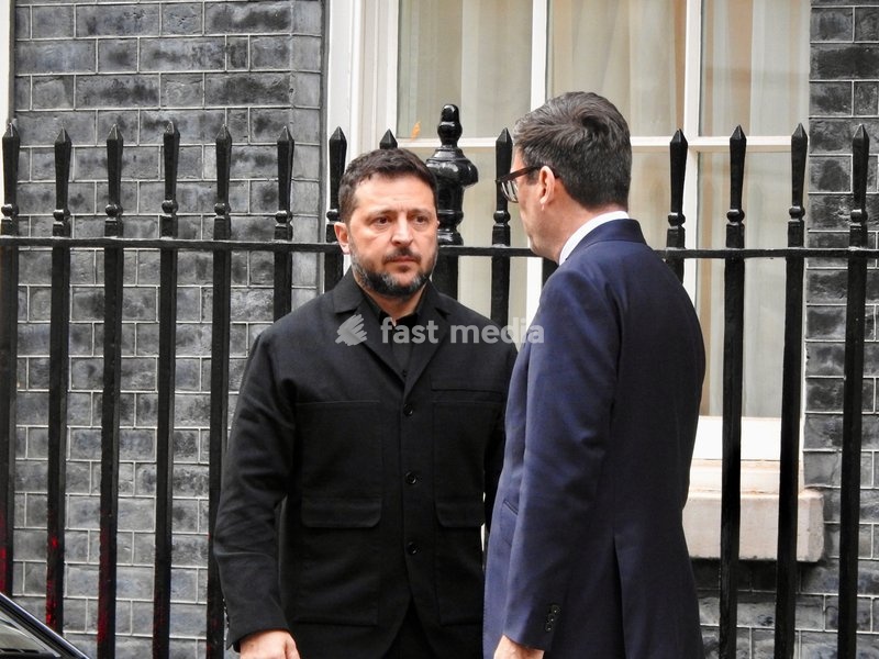 London, UK. 14 October 2026. Ukrainian President Volodymyr Zelenskyy talks with British Prime Minister Andy Burnham outside 10 Downing Street during his visit to London, as the two countries continue diplomatic discussions over the war in Ukraine