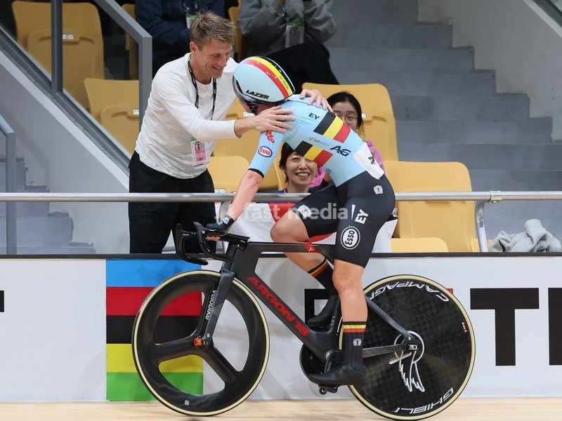 Kopecky's husband Axel Merckx and Belgian Lotte Kopecky celebrate after winning the Women's Elimination event at the UCI Track Cycling World Championships in Shanghai, China on Thursday 15 October 2026. The worlds are taking place from 14 to 18 October 2026