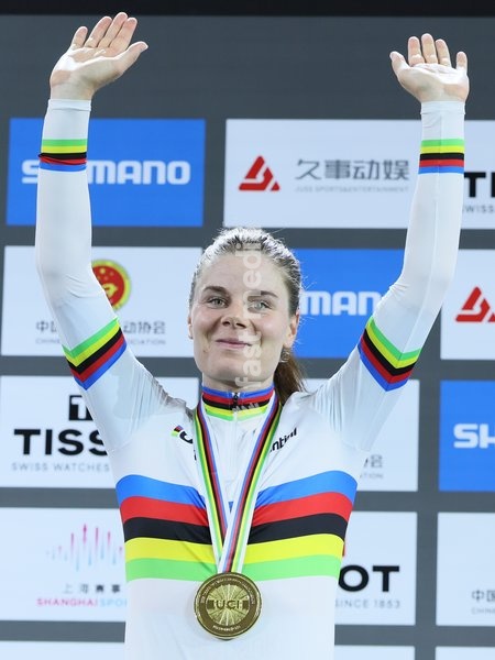 Belgian Lotte Kopecky celebrates on the podium after winning the Women's Elimination event at the UCI Track Cycling World Championships in Shanghai, China on Thursday 15 October 2026. The worlds are taking place from 14 to 18 October 2026